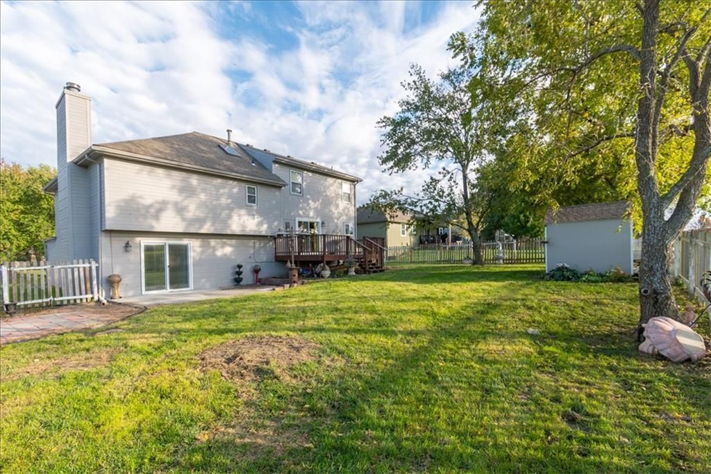 Big backyard and flat lot at 1628 NE AUBURN Drive, Lee's Summit, MO 64086