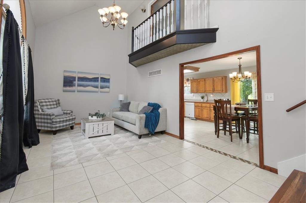 Tall ceilings, open floor plan and two-story living room at 1628 NE AUBURN Drive, Lee's Summit, MO 64086