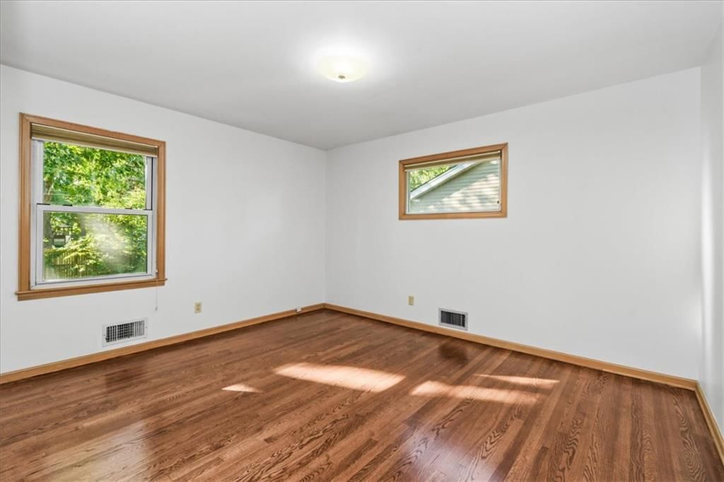 Walk-in shower and tiled shower at 11000 Washington Street, Kansas City, MO 64114
