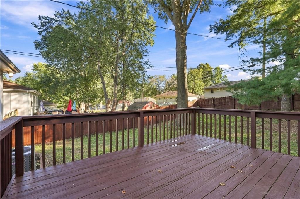 Deck, fenced yard and wood fence at 15401 E 36th Street S, Independence, MO 64055