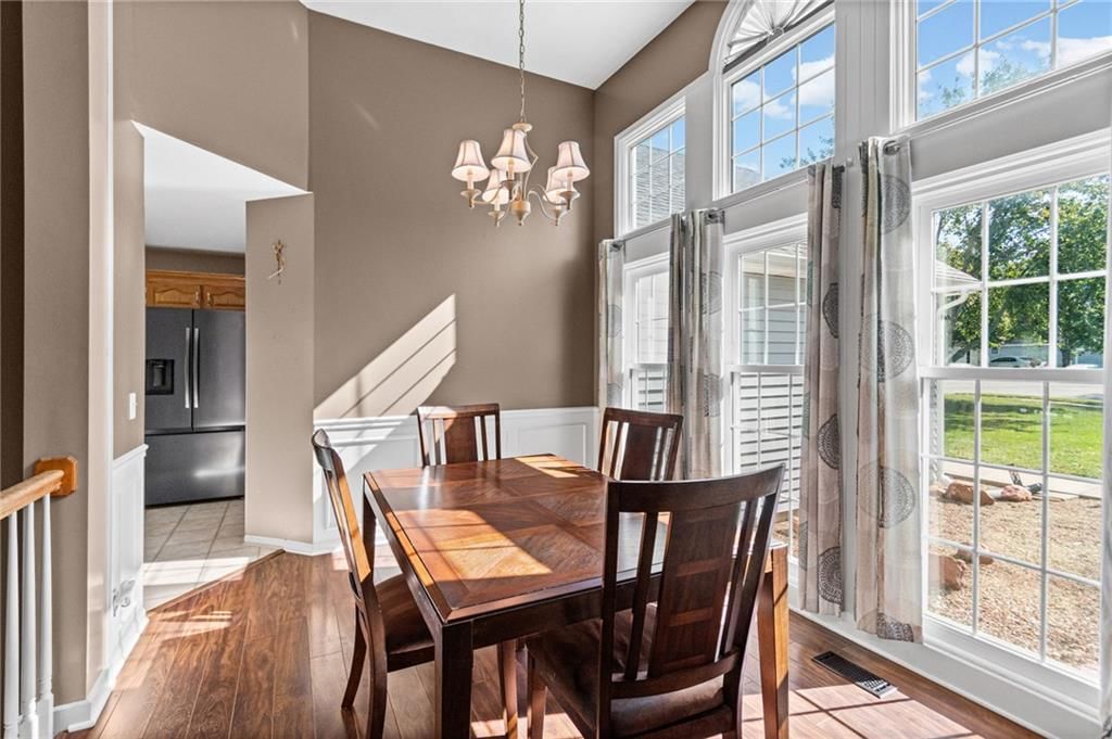 Statement lighting and wainscoting or board and batten at 13470 Timber Park Lane, Platte City, MO 64079