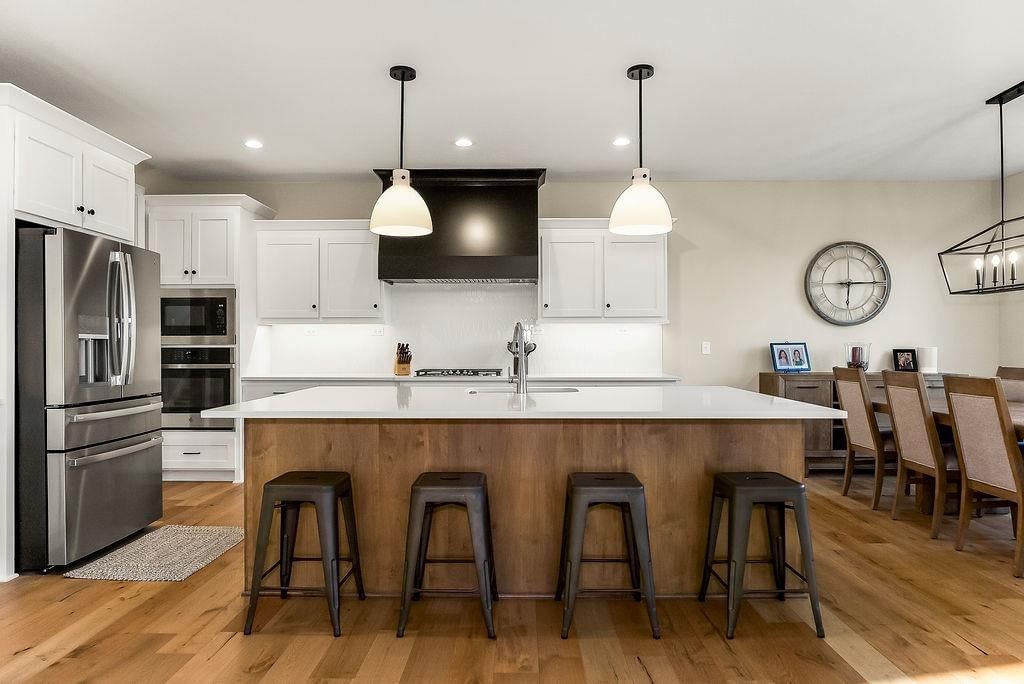 Photo 9: white kitchen cabinets, 18337 Monrovia Street, Overland Park, KS 66013