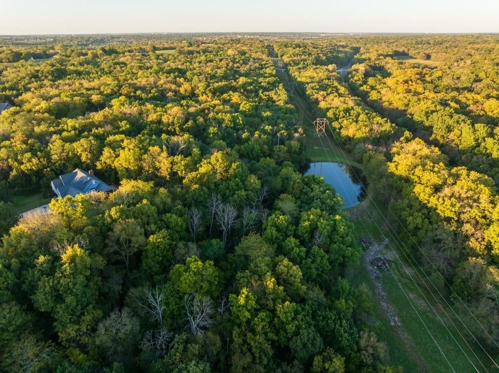 Pond or creek visible on the lot at 4990 W 178th Terr, Stilwell, KS 66085