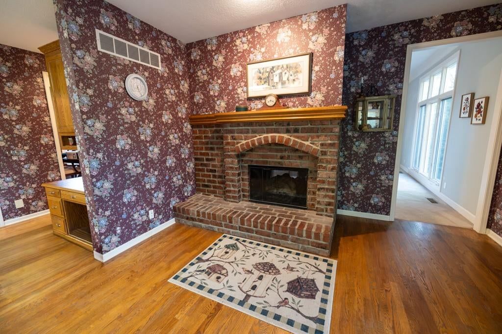 Fireplace and brick fireplace at 4990 W 178th Terr, Stilwell, KS 66085