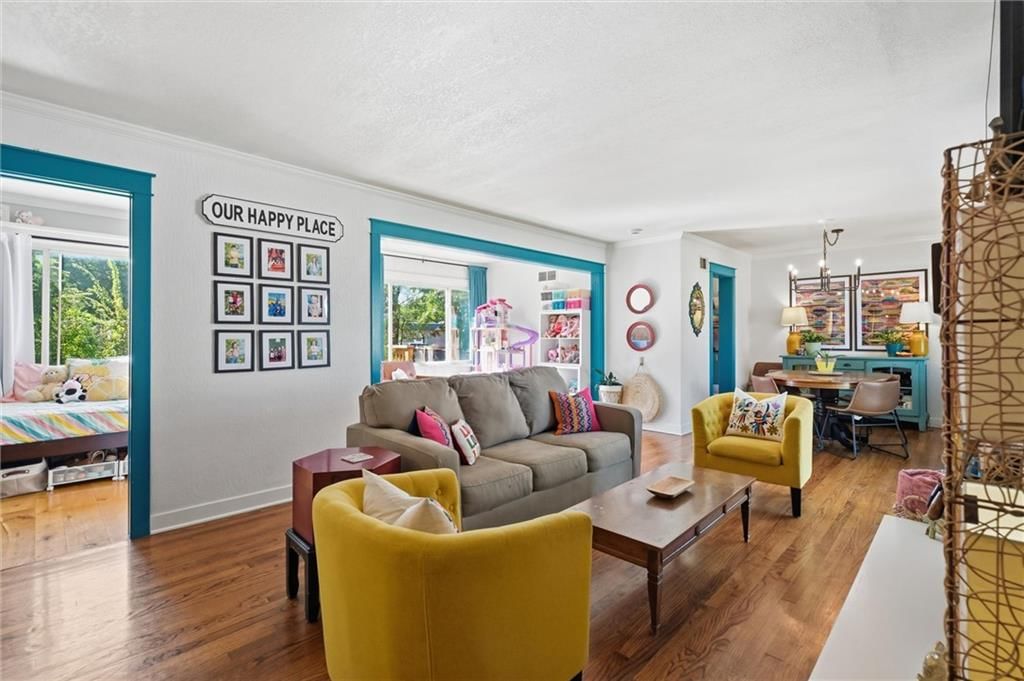 Open floor plan, hardwood floors and black hardware at 725 W Elm Street, Olathe, KS 66061