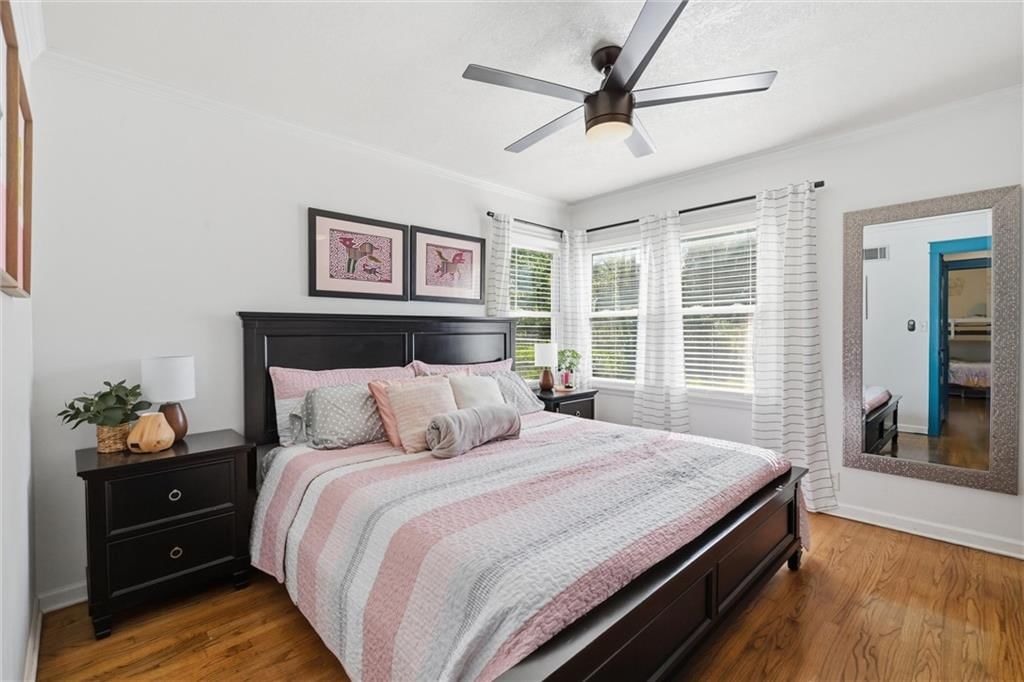 Main-floor primary bedroom at 725 W Elm Street, Olathe, KS 66061