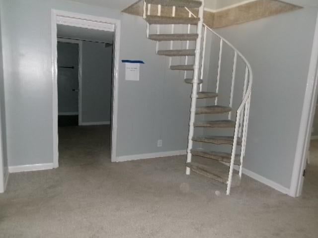 Curved staircase, staircase and iron stair railing at 3811 S Delaware Avenue, Independence, MO 64055
