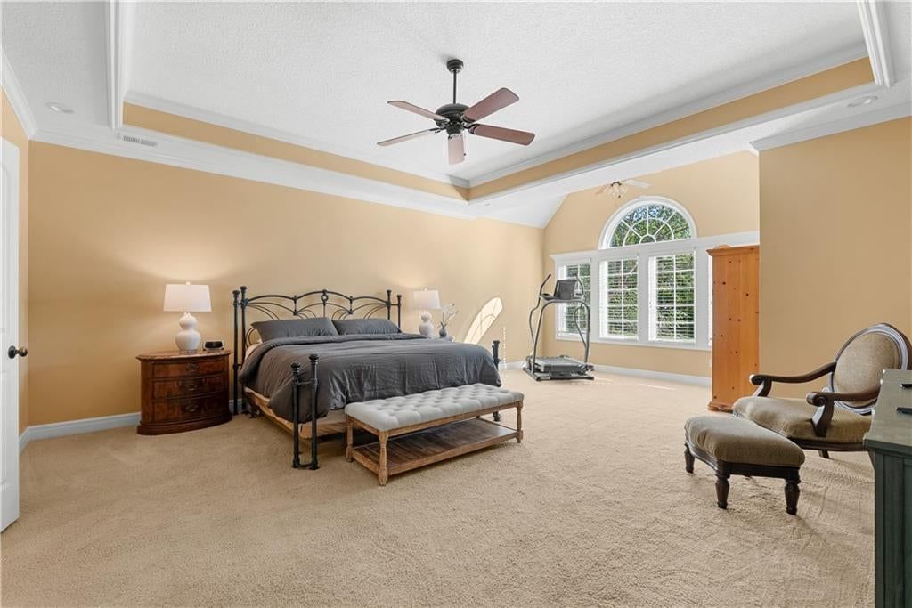 Tall ceilings, tray ceiling and bedroom sitting area at 311 NW Rockwood Court, Lee's Summit, MO 64081