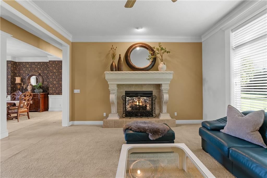 Fireplace and stone fireplace at 311 NW Rockwood Court, Lee's Summit, MO 64081