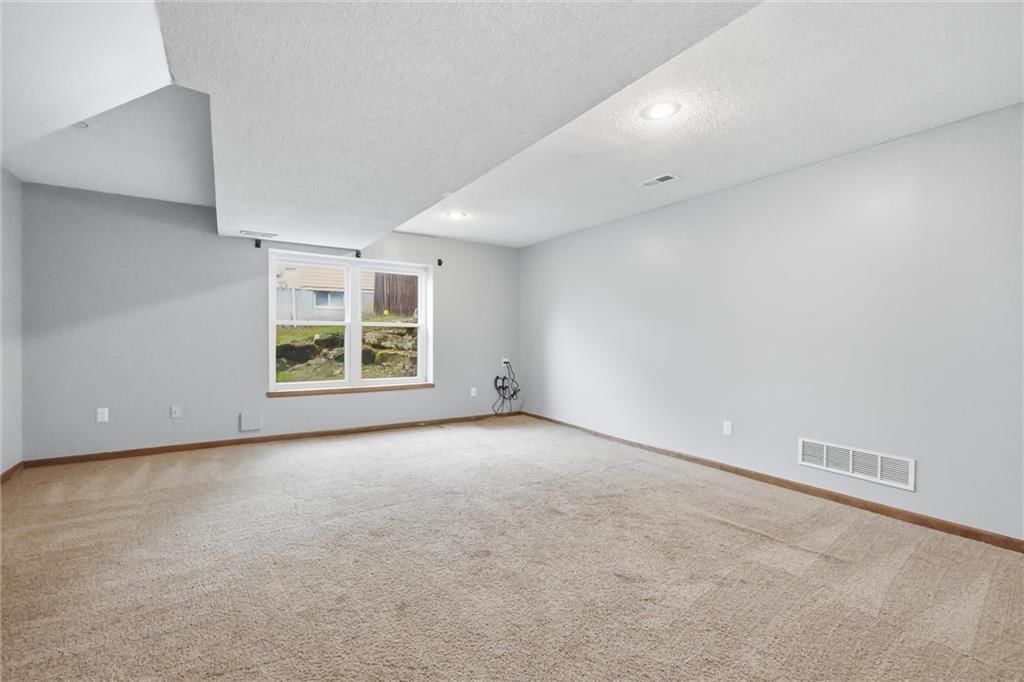 Finished basement at 701 NW Rosaceae Drive, Blue Springs, MO 64015