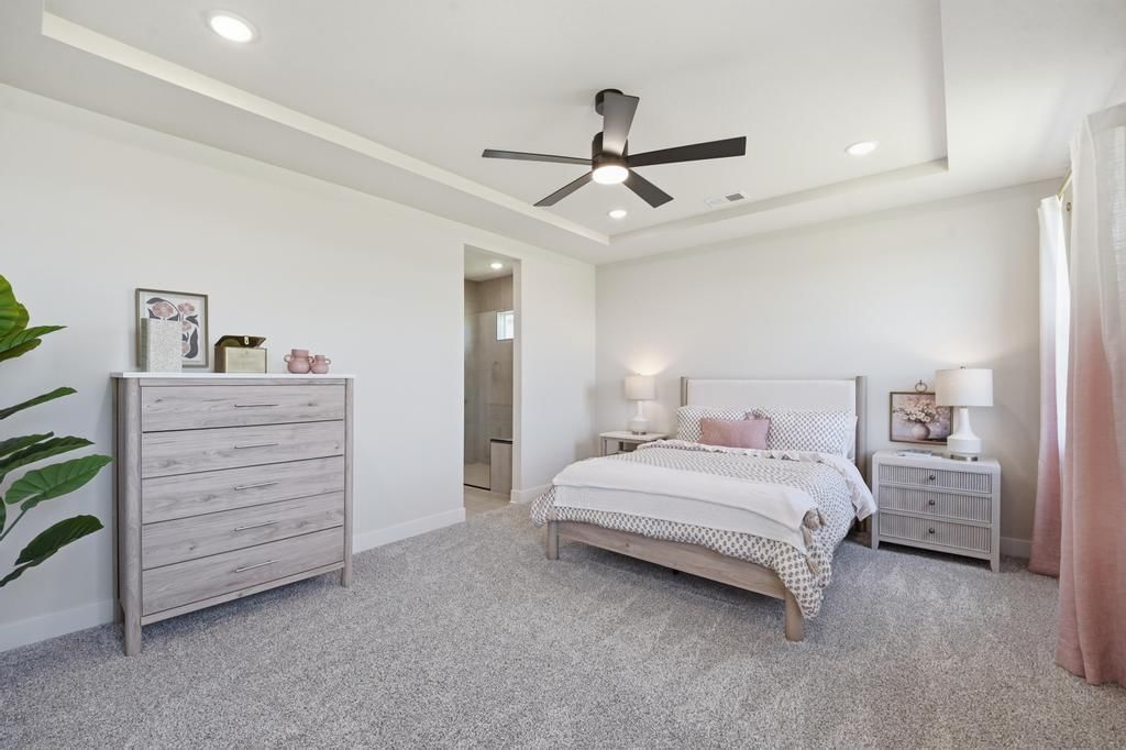 Main-floor primary bedroom at 17690 Jubilee Street, Gardner, KS 66030