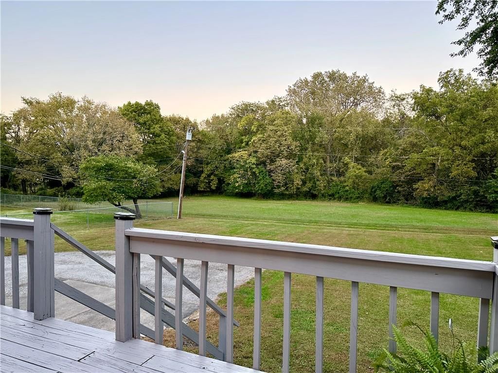 Big backyard, mature trees and flat lot at 16003 Allen Street, Belton, MO 64012