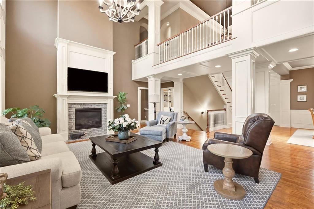 Tall ceilings, fireplace and wainscoting or board and batten at 20108 W 92nd Street, Lenexa, KS 66220