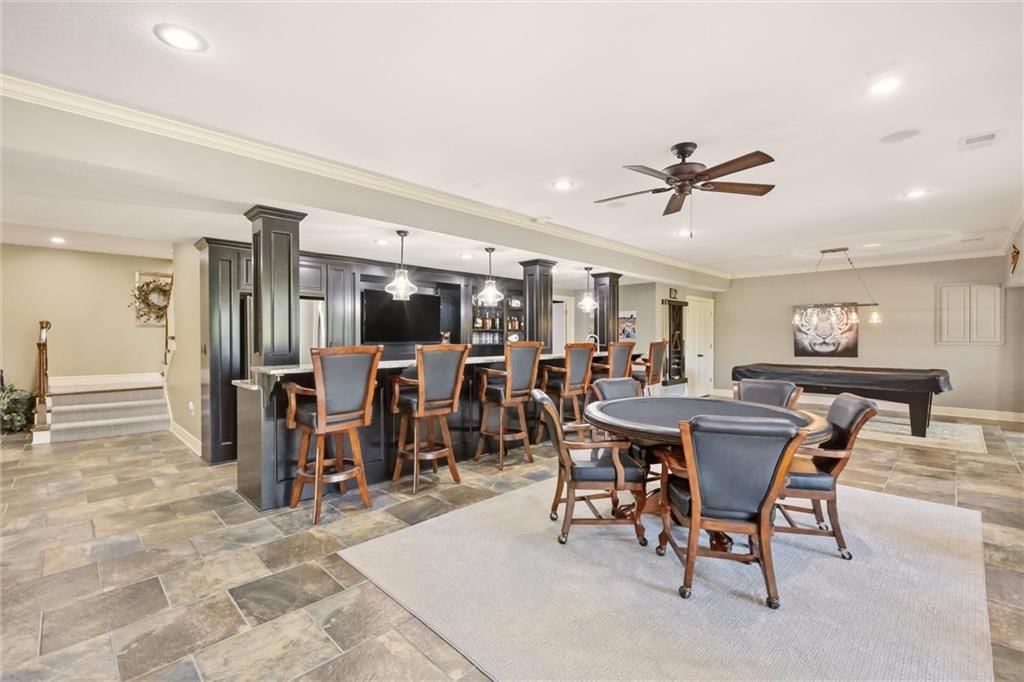 Finished basement, tile floors and wet bar at 20108 W 92nd Street, Lenexa, KS 66220