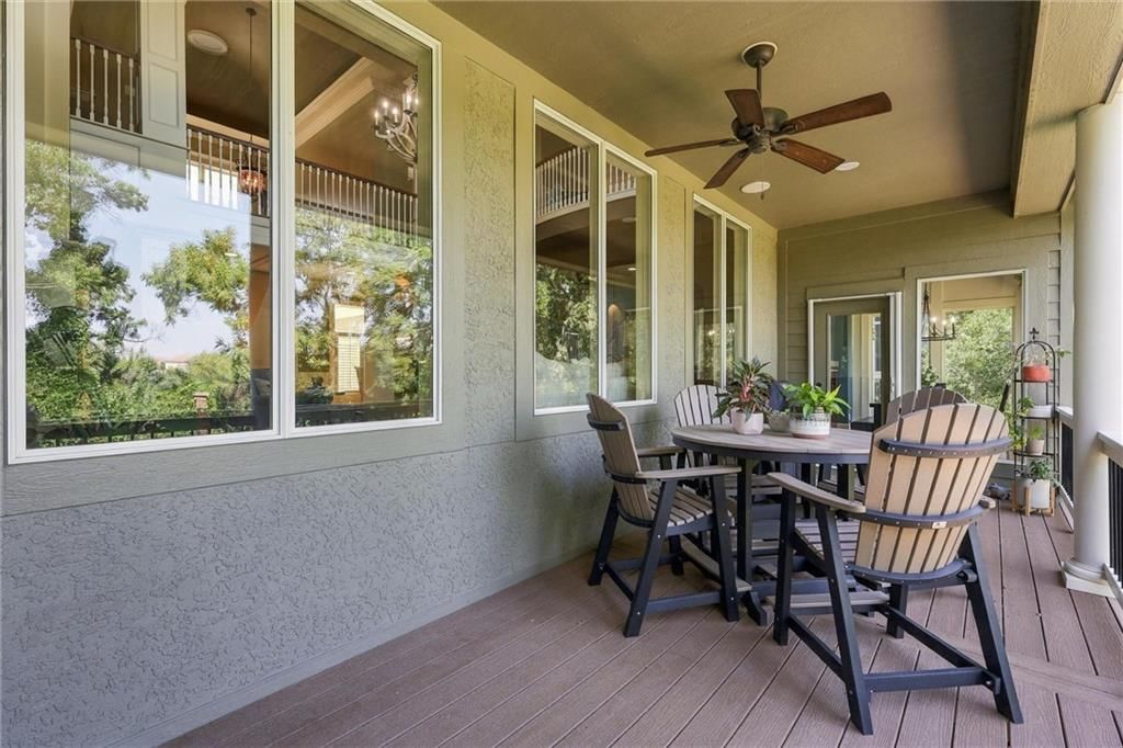 Fire pit, covered patio and concrete patio at 20108 W 92nd Street, Lenexa, KS 66220