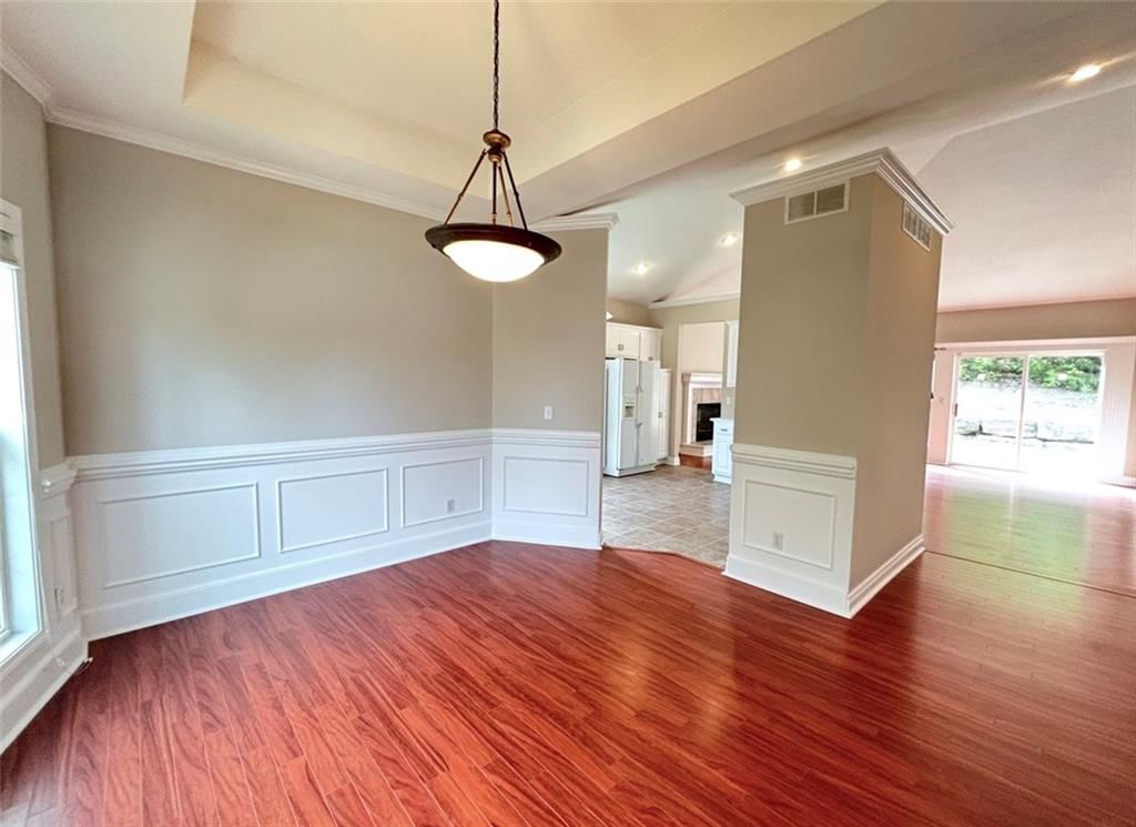 Statement lighting, wainscoting or board and batten and breakfast nook at 7826 Mullen, Lenexa, KS 66216