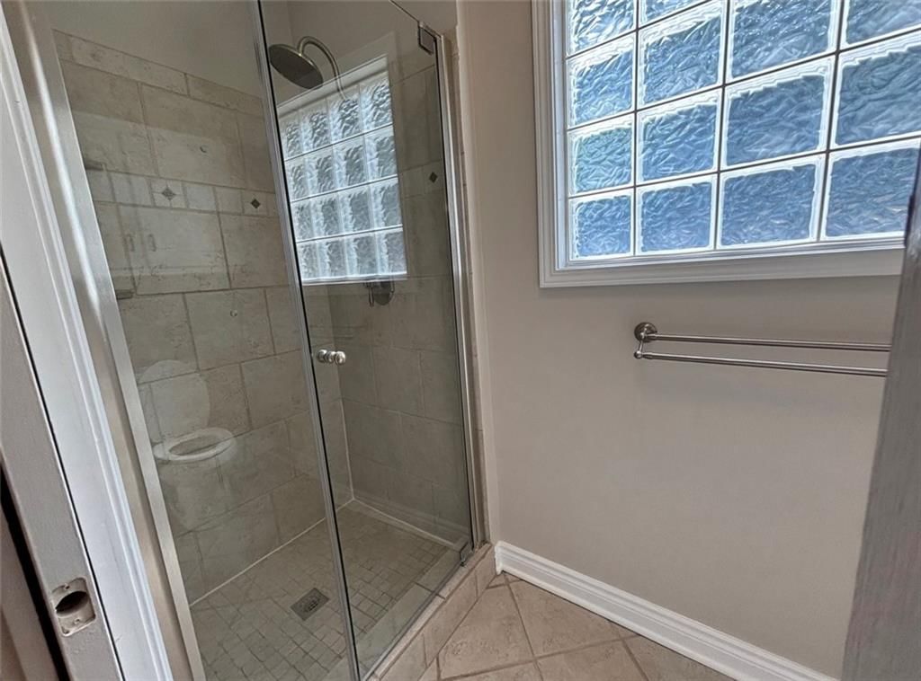 Walk-in shower and tiled shower at 7826 Mullen, Lenexa, KS 66216