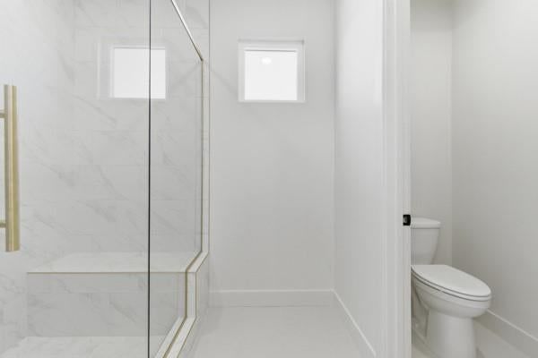 Walk-in shower, tiled shower and frameless glass shower at 16055 Eisenhower Road, Leavenworth, KS 66048