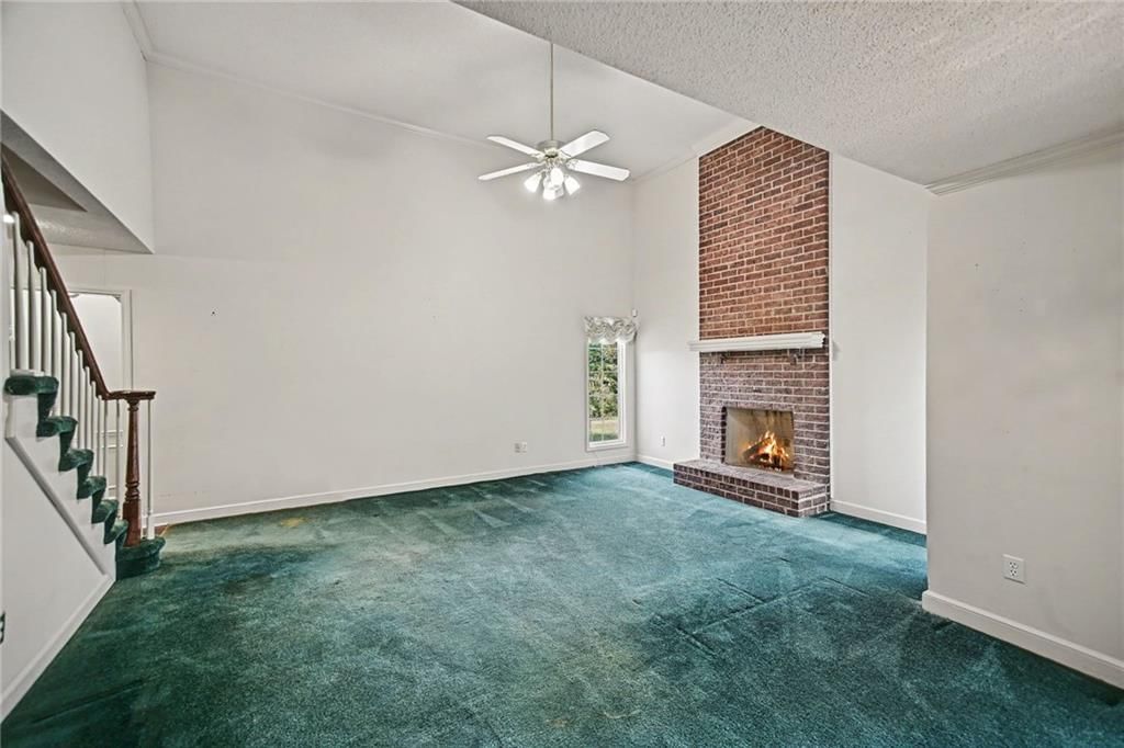Fireplace and brick fireplace at 24909 E Blue Mills Road, Independence, MO 64058