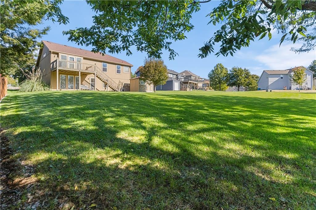 Big backyard, fenced yard and mature trees at 23707 W 58th Terrace, Shawnee, KS 66226