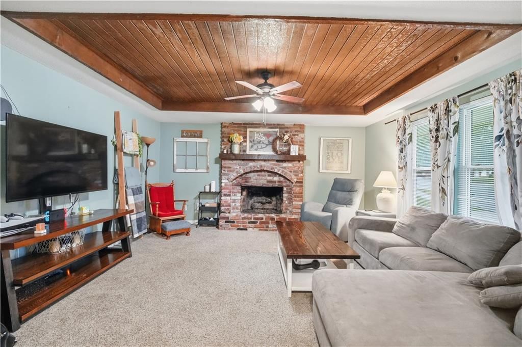 Fireplace and exposed brick wall at 7415 NW 80th Terrace, Kansas City, MO 64152