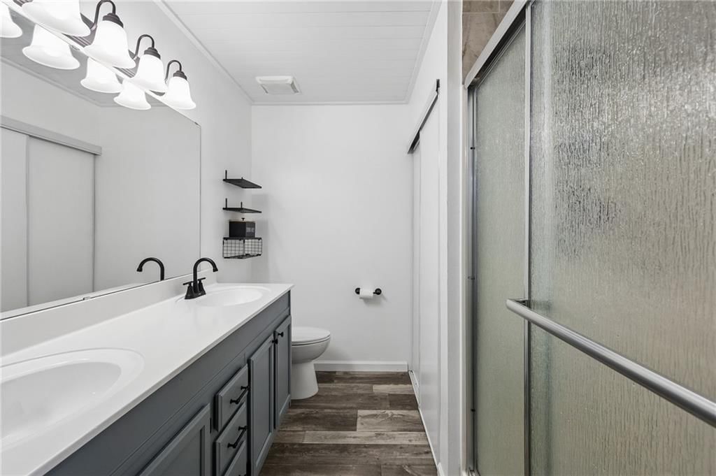 Double vanity and gray vanity at 1432 NW Yankee Drive, Blue Springs, MO 64015