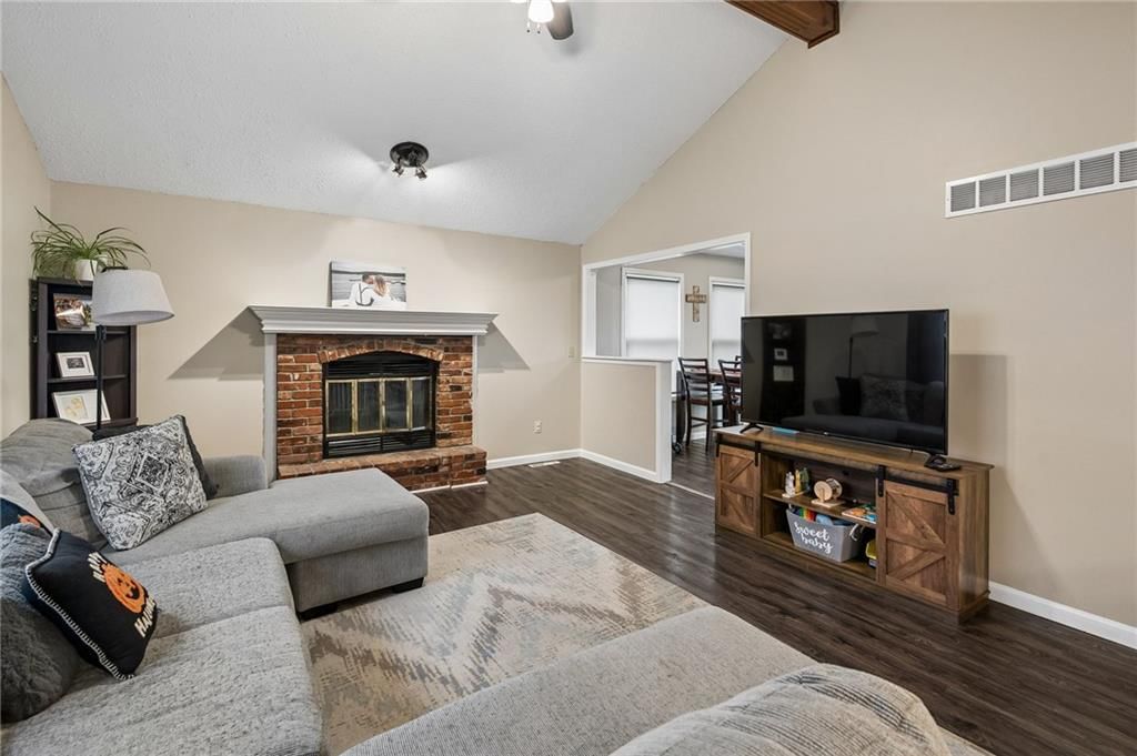 Luxury vinyl floors and beige walls at 1432 NW Yankee Drive, Blue Springs, MO 64015