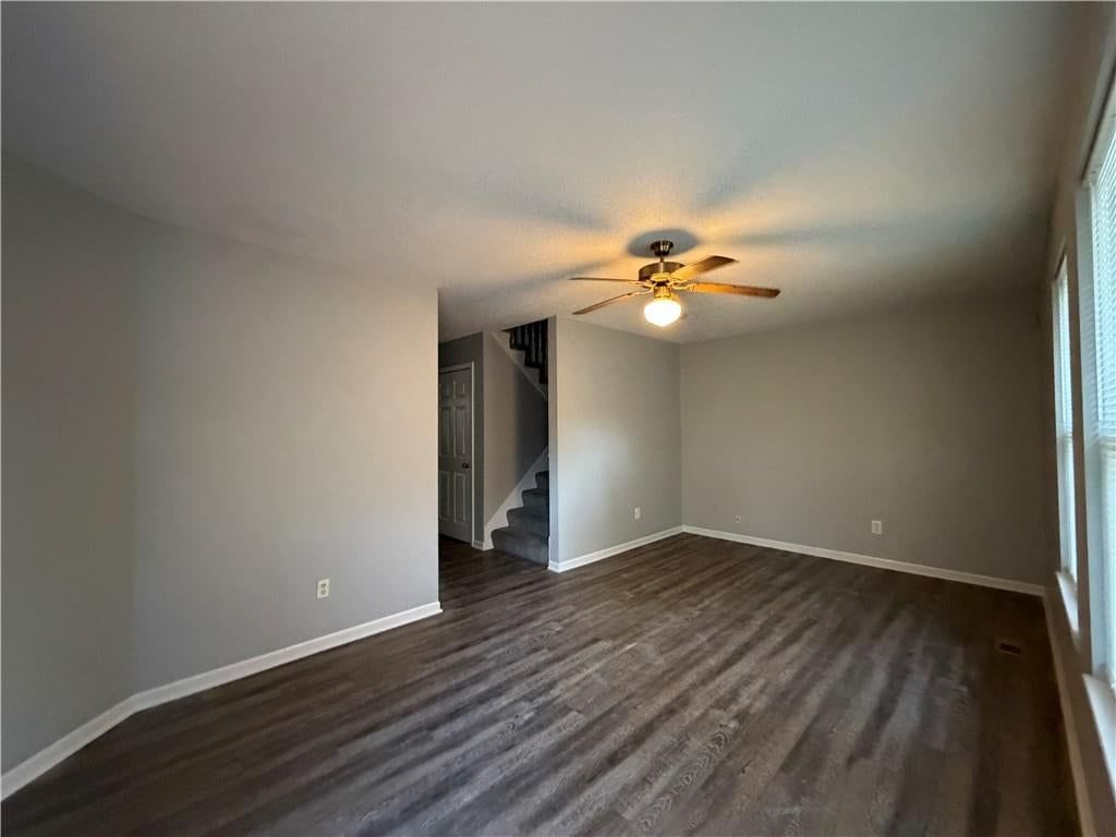 Luxury vinyl floors, staircase and white trim at 1700 W Walnut Street, Independence, MO 64050