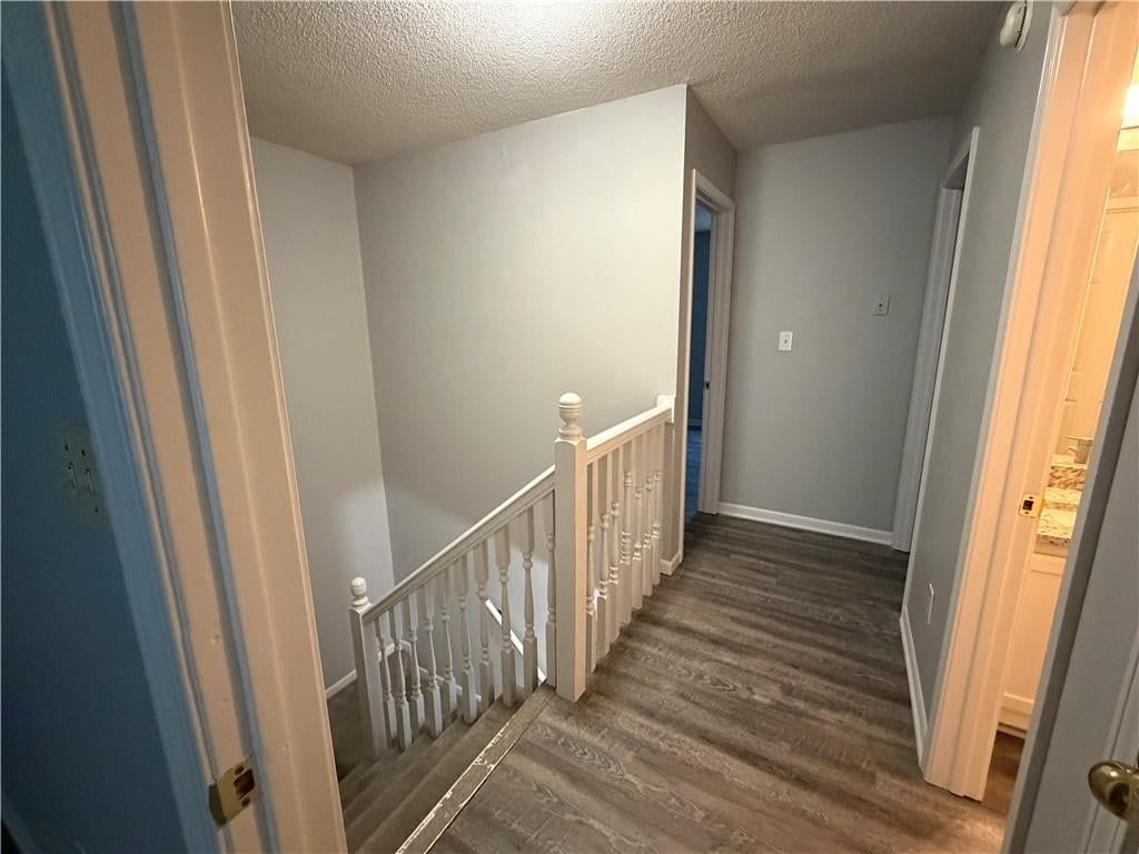 Wood stair railing at 1700 W Walnut Street, Independence, MO 64050