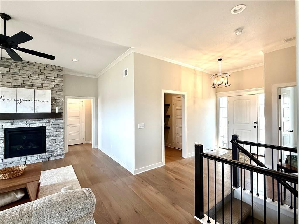 Staircase, iron stair railing and black hardware at 9913 N Manning Avenue, Kansas City, MO 64157