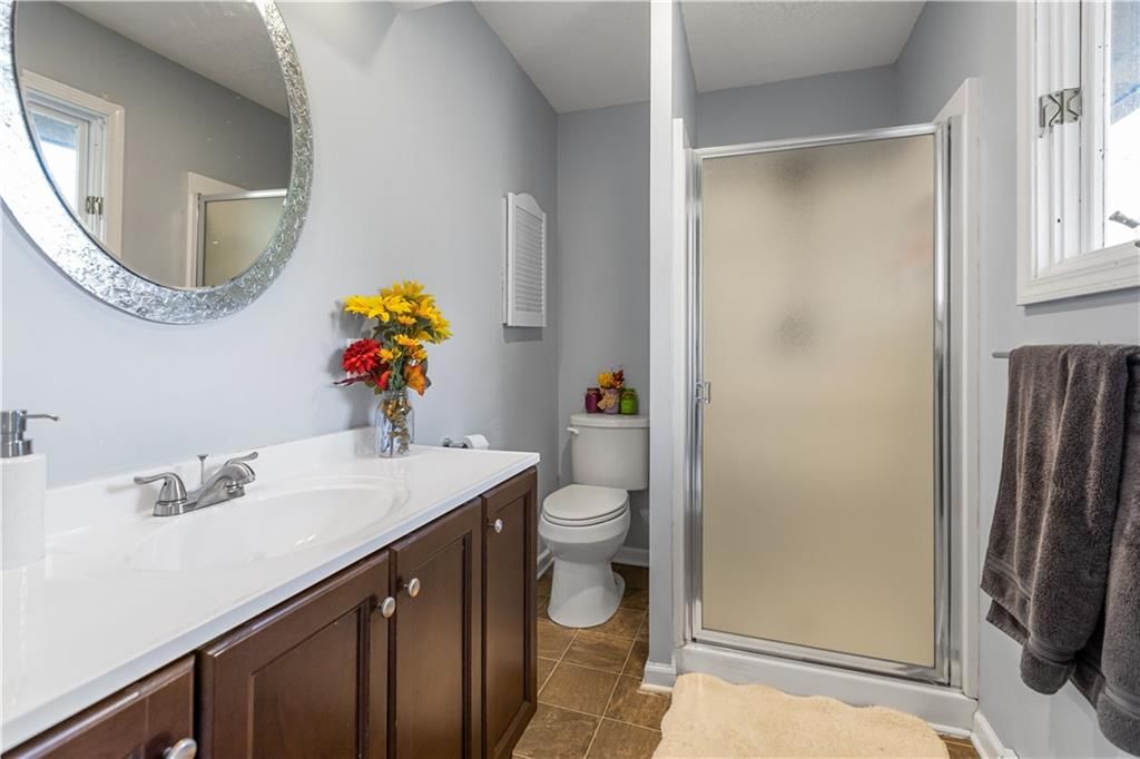 Tiled shower at 21018 BITTERSWEET Drive, Lenexa, KS 66220