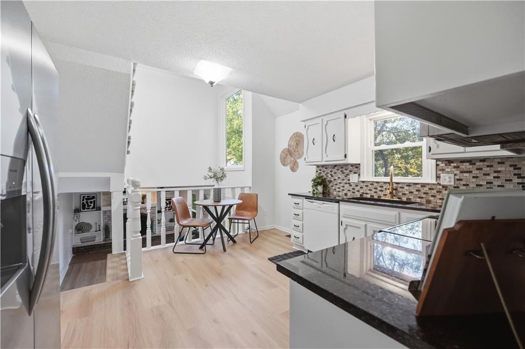 Photo 11: open floor plan, 2004 E 144th Terrace, Olathe, KS 66062