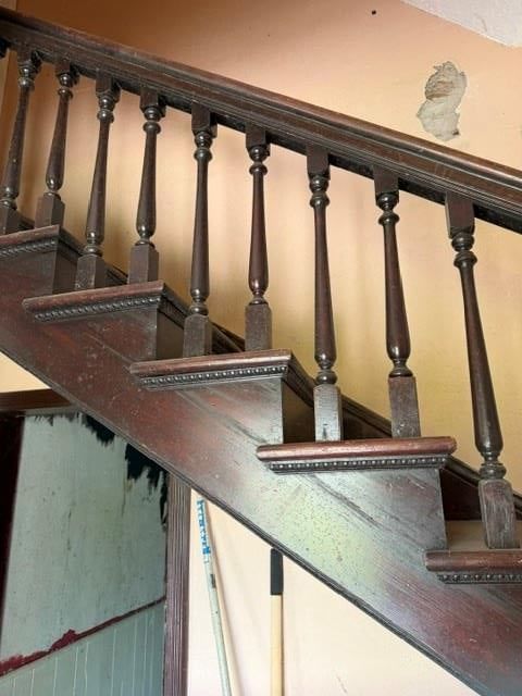 Staircase and wood stair railing at 116 Cliff Drive, Excelsior Springs, MO 64024