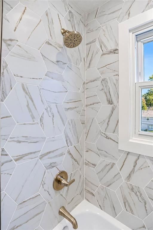 Tiled shower at 9931 Woodson Drive, Overland Park, KS 66207