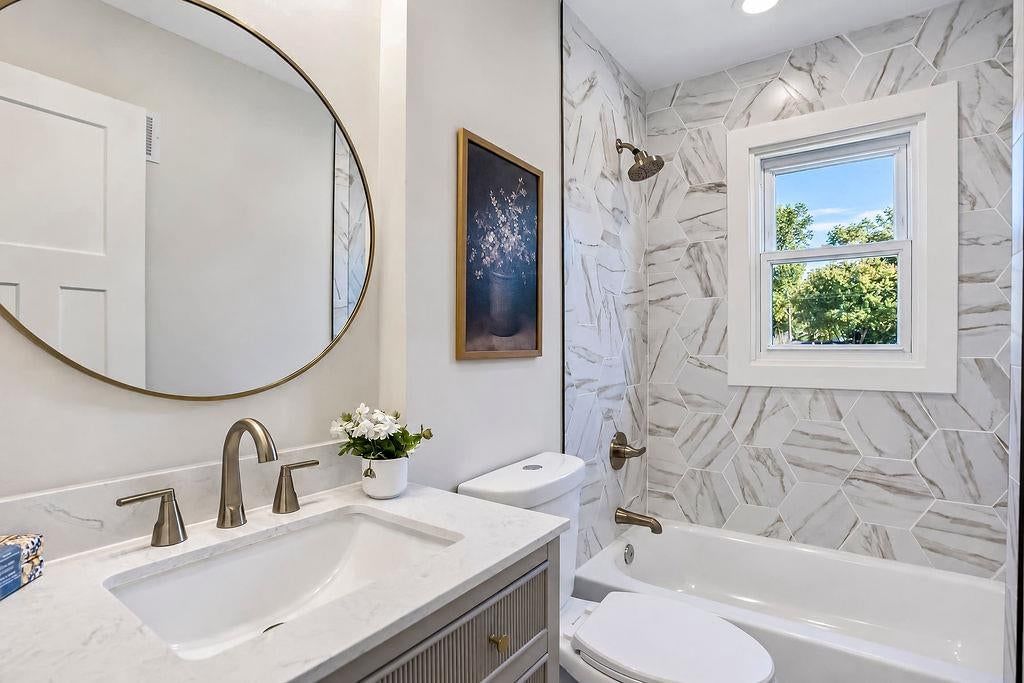 Tub and shower combo at 9931 Woodson Drive, Overland Park, KS 66207