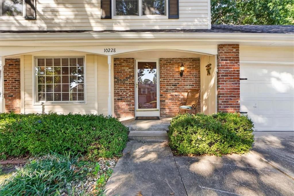 Covered front porch at 10228 Caenen Drive, Lenexa, KS 66215