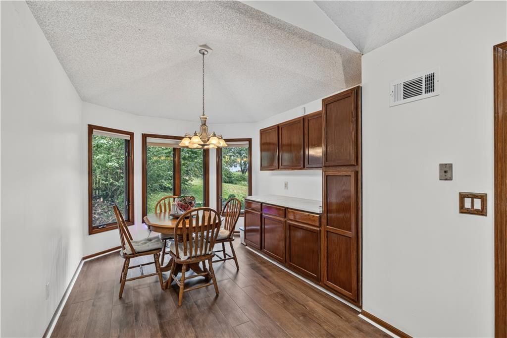Home office and wall of windows at 5348 W 102 Street, Overland Park, KS 66207