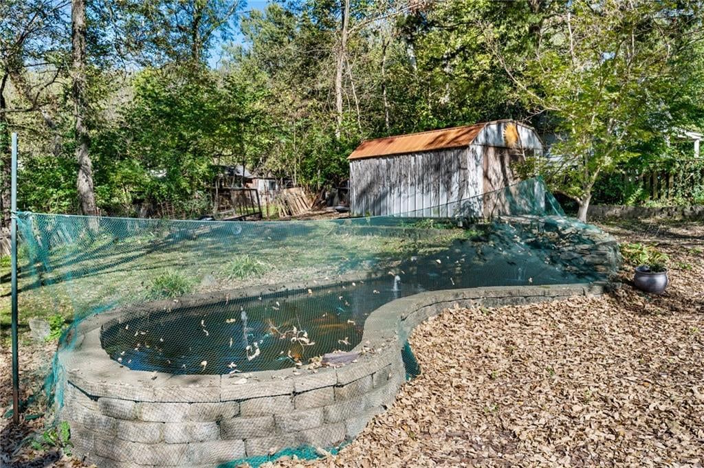 Pond or creek visible on the lot at 8648 E 27th Street, Kansas City, MO 64129