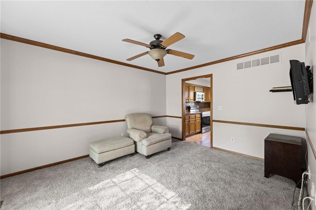 Beige walls and carpet at 14804 W 84th Terrace, Lenexa, KS 66215
