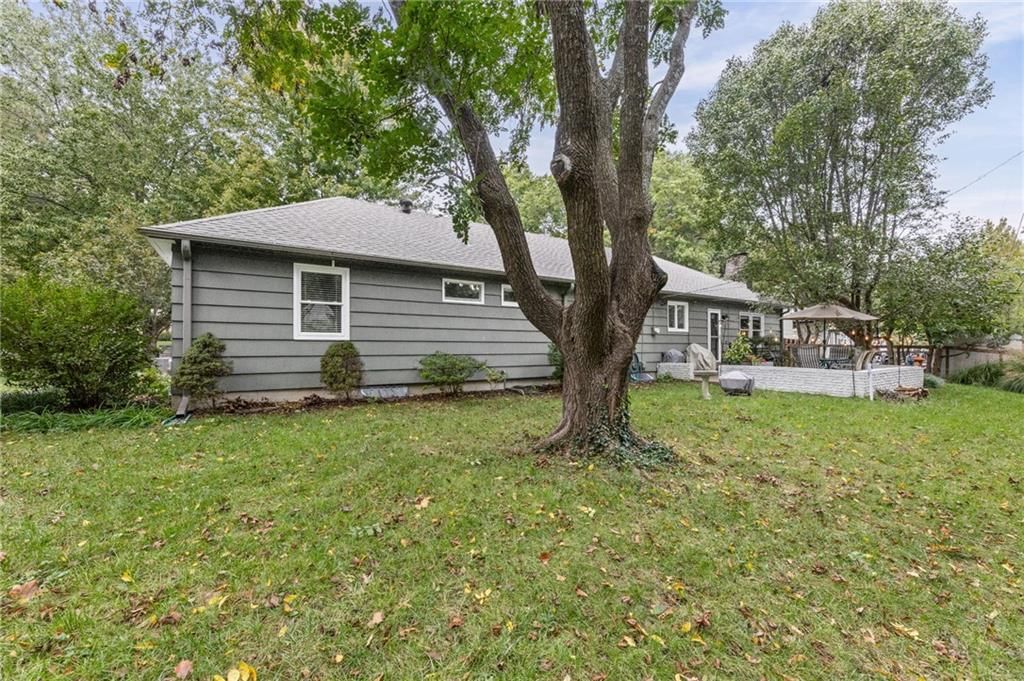 Gray exterior and siding exterior at 6527 Maple Drive, Mission, KS 66202