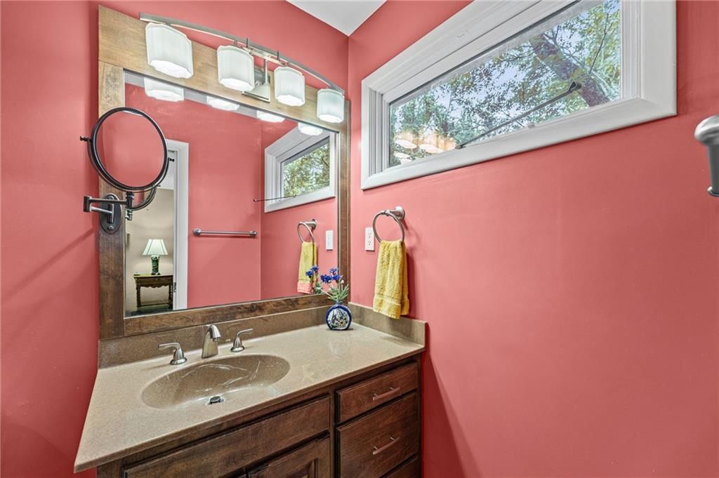 Double vanity and wood vanity at 6527 Maple Drive, Mission, KS 66202