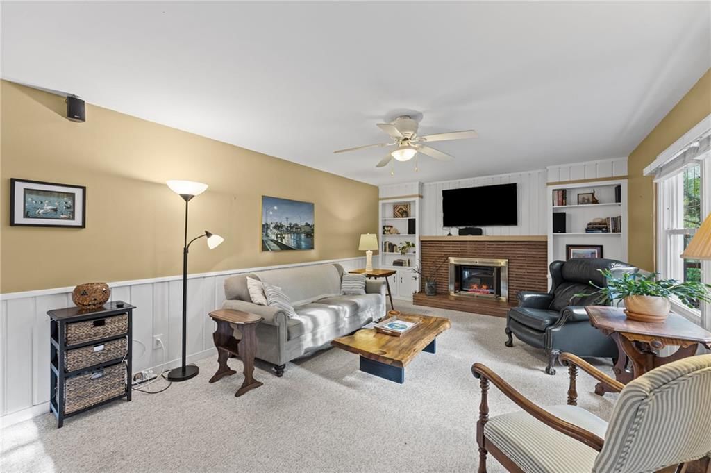 Tall ceilings, fireplace and open floor plan at 6527 Maple Drive, Mission, KS 66202