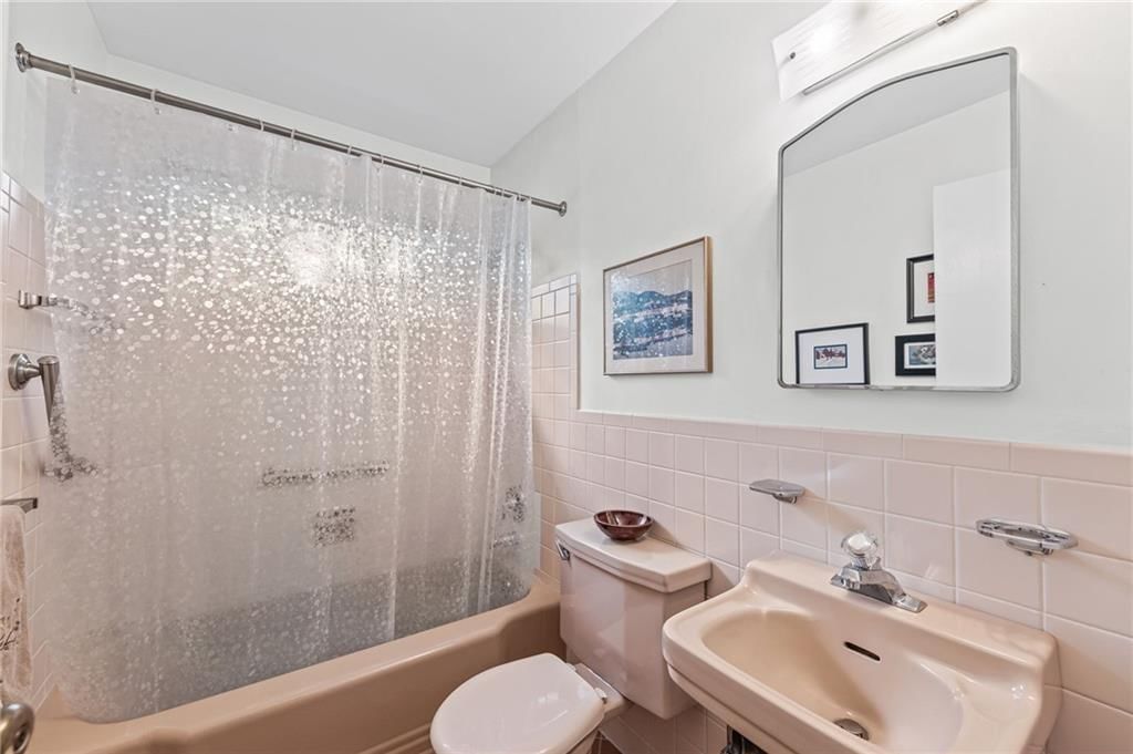 Tub and shower combo at 6527 Maple Drive, Mission, KS 66202