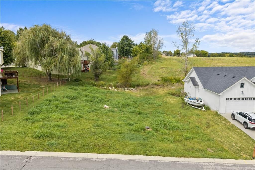 104 E WHISPERING HILLS Boulevard, Lone Jack, MO: listing photo 3