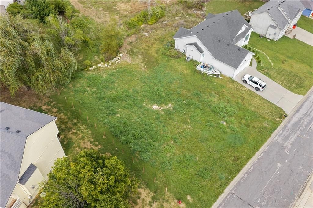 Photo 4 of 6 - 104 E WHISPERING HILLS Boulevard, Lone Jack, MO 64070