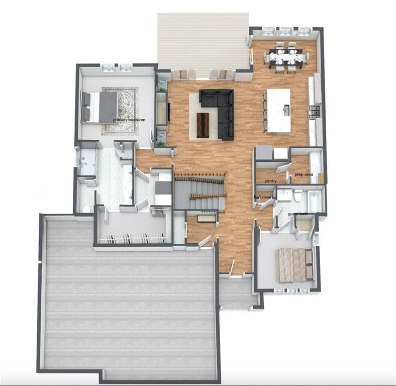 Open floor plan, main-floor primary bedroom and kitchen island at 9117 N Cleveland Avenue, Kansas City, MO 64156