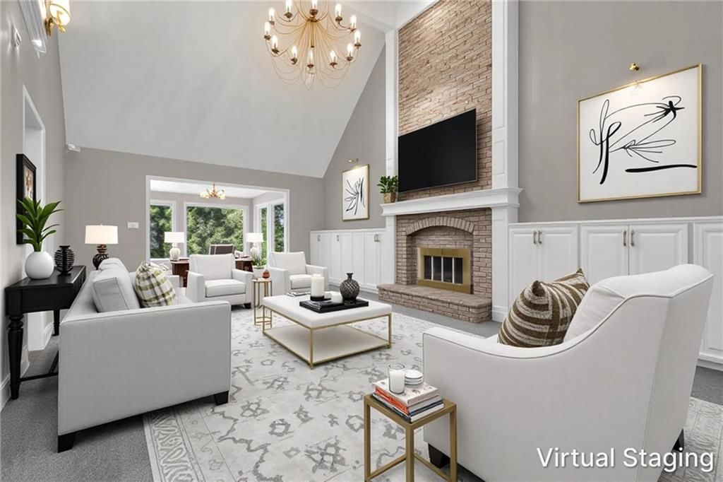 Tall ceilings, fireplace and open floor plan at 3806 NE Beechwood Drive, Lee's Summit, MO 64064