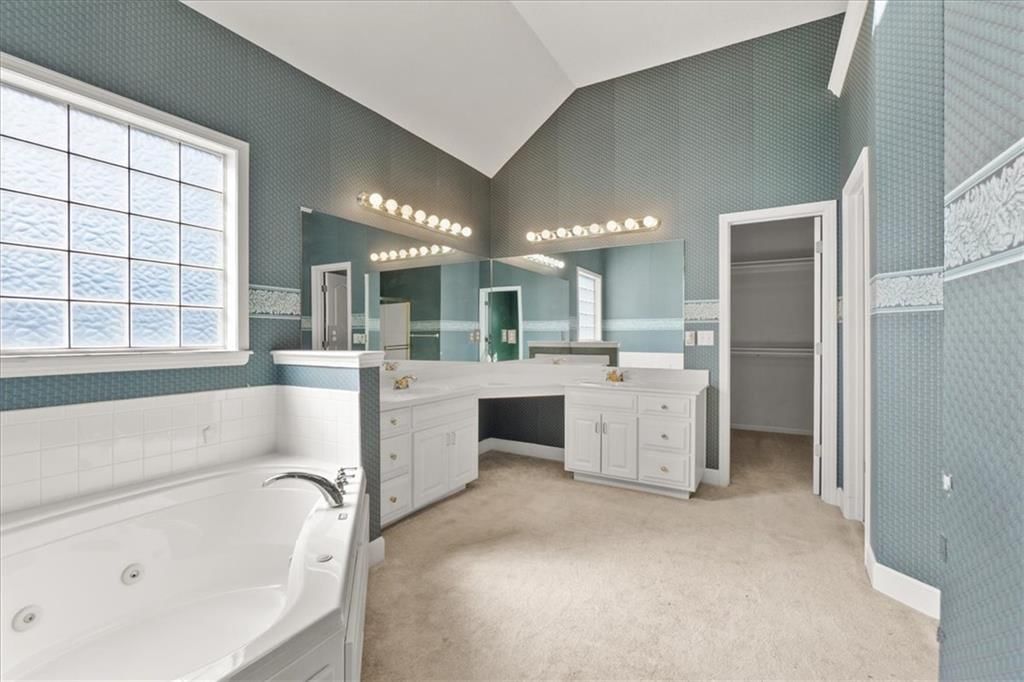 Double vanity and white vanity at 3730 S Milton Drive, Independence, MO 64055
