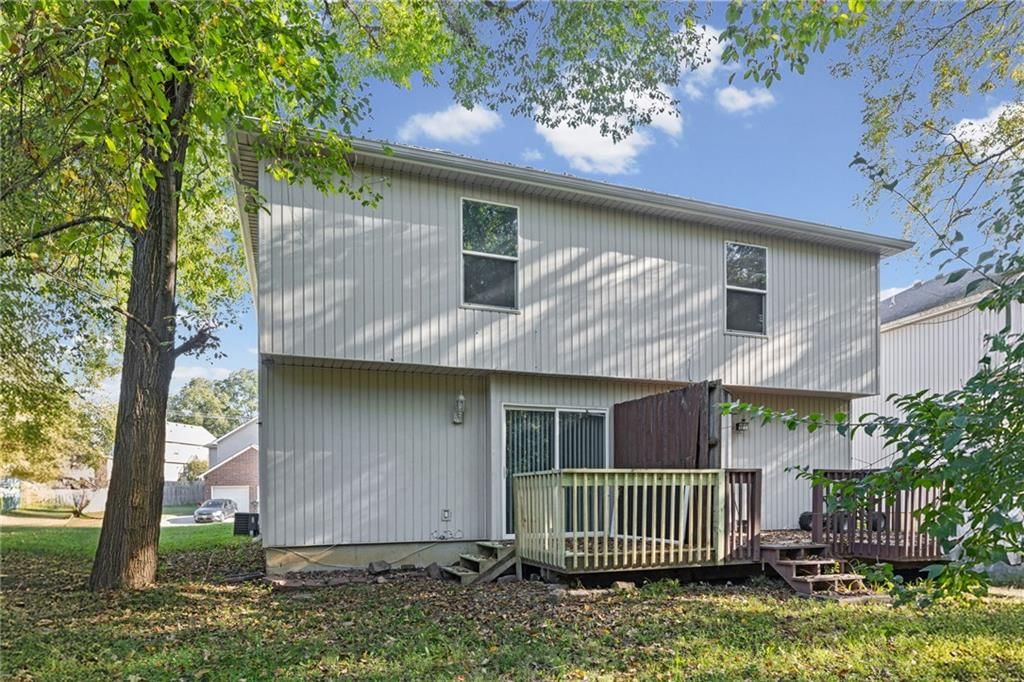 Deck and mature trees at 18501 E 3rd Street Court N, Independence, MO 64056