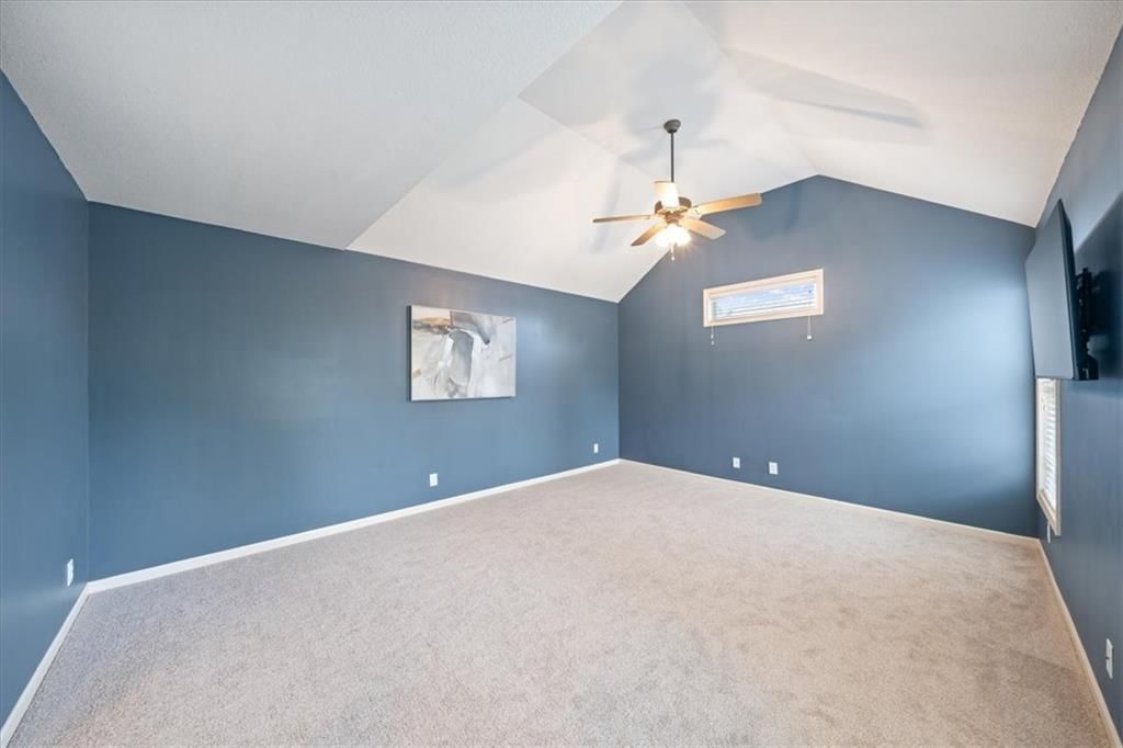 Tall ceilings and carpet at 10138 Theden Circle, Lenexa, KS 66220